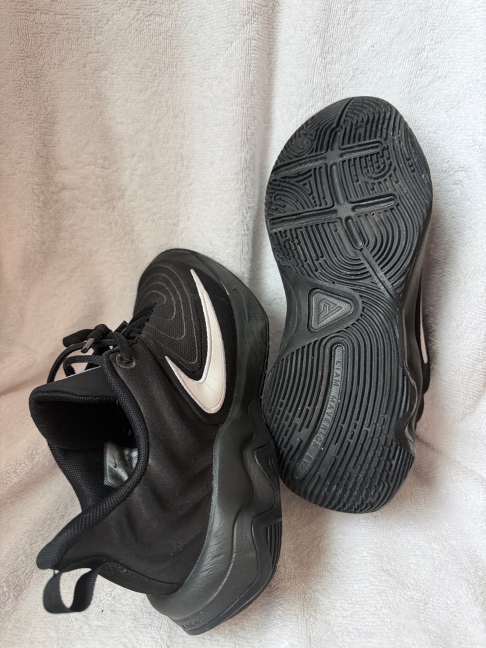 Nike Black Sneakers with White Swoosh Accent